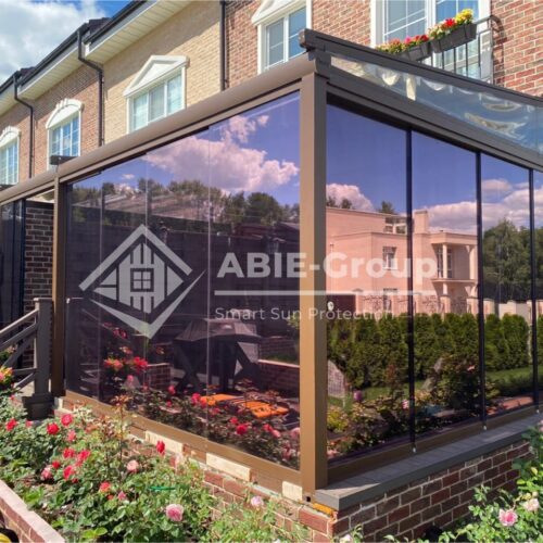 Фотографии выполненных работ компании «ABIE-GROUP»  алюминиевой перголы со сдвижной крышей и безрамным остеклением. КП Вудлэнд, дер.Мисайлово, Ленинский городской округ, Московская область.